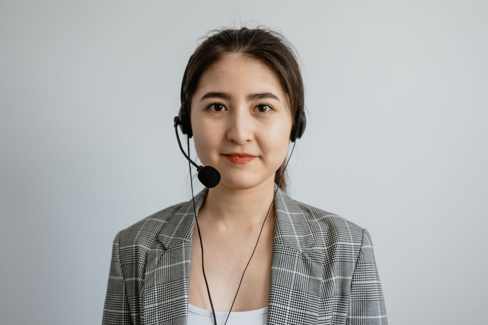 A language specialist wearing a headset